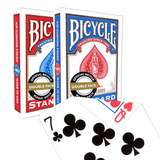 Bicycle playing cards with a red and blue design, featuring a doubled faced playing card.