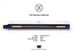 A wooden Haschka collection wand presented in its white and navy blue gift box, with product specifications and a 'Proudly Made in Wales' logo printed below on a white background.