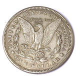 Replica coin with eagle design and 'In God We Trust' inscription on a white background